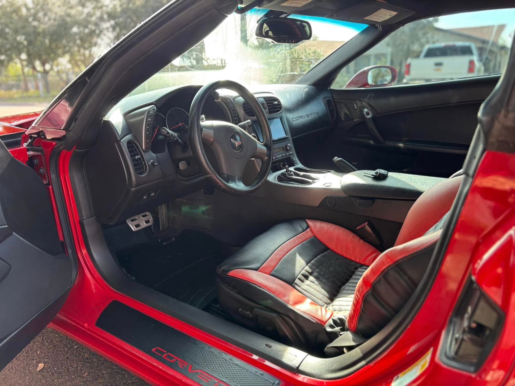 Orange Lamborghini interior with carbon fiber trim, cabin detailed